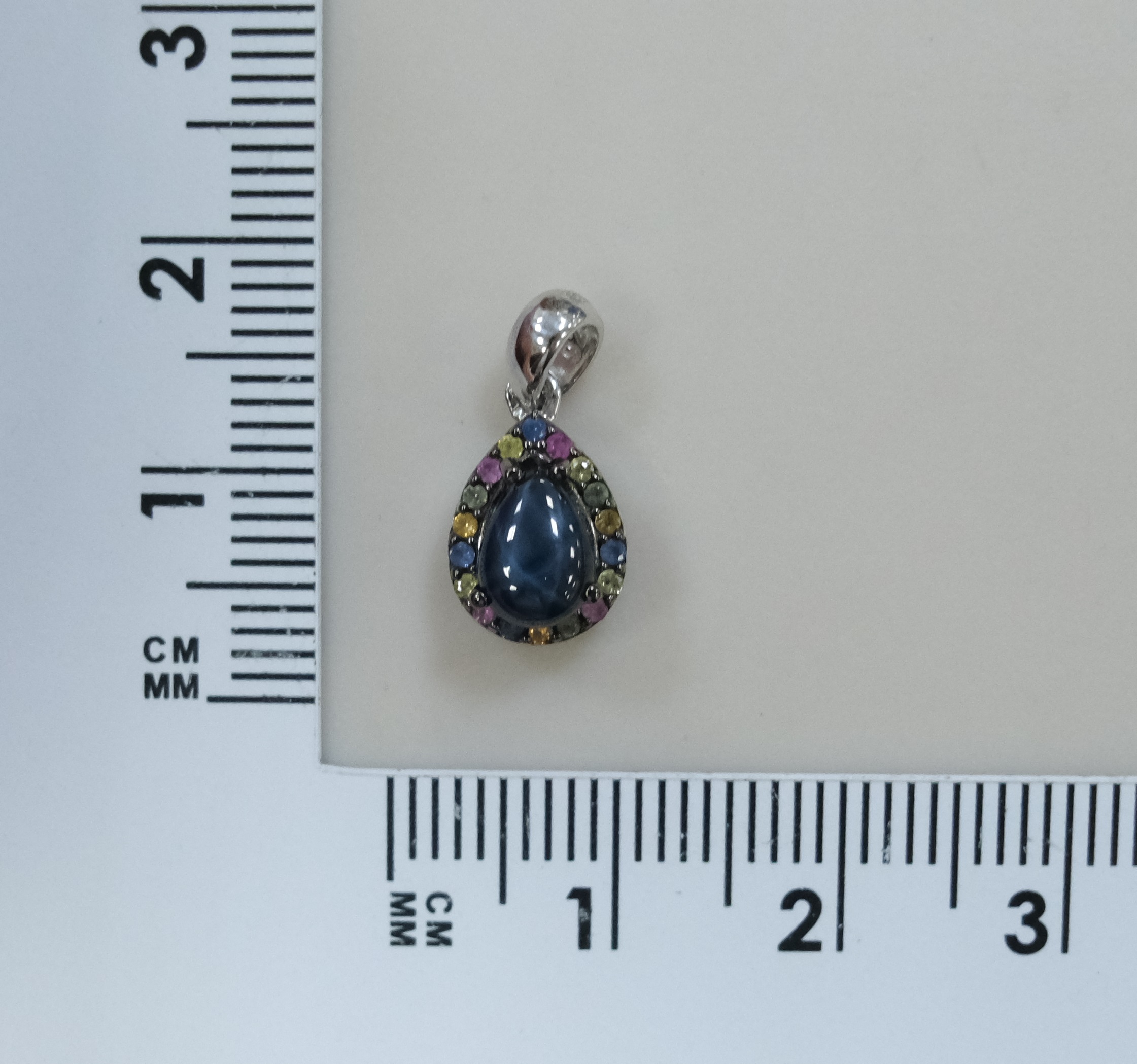 Серебряная подвеска со звездчатым сапфиром
